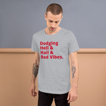 Load image into Gallery viewer, Dodging Hell & Hail & Bad Vibes Short-Sleeve UNISEX tee